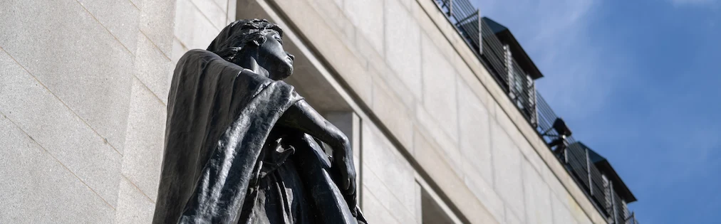 A statue in front of the Supreme Court of Canada building