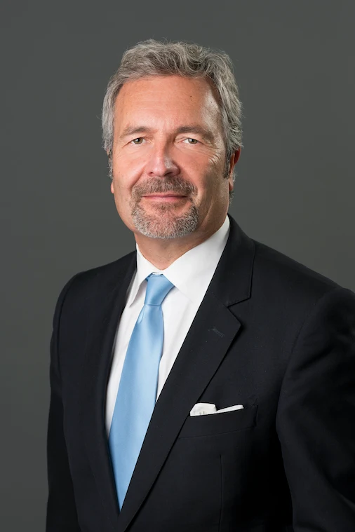 Justice Glenn D. Joyal in business attire